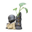Sculpture En Argile Figurine Moine Calme Avec Plante