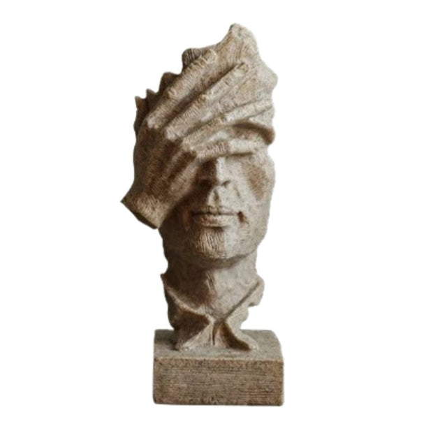 Sculpture Visage Doré Avec Main Expressive En Design Abstrait