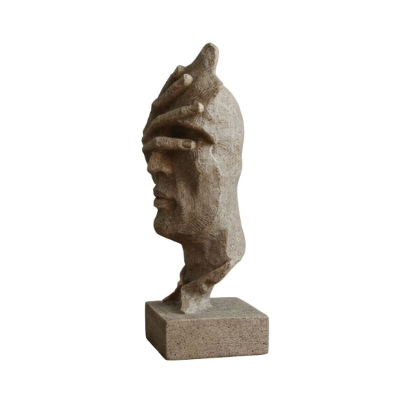 Sculpture Visage Doré Avec Main Expressive En Design Abstrait